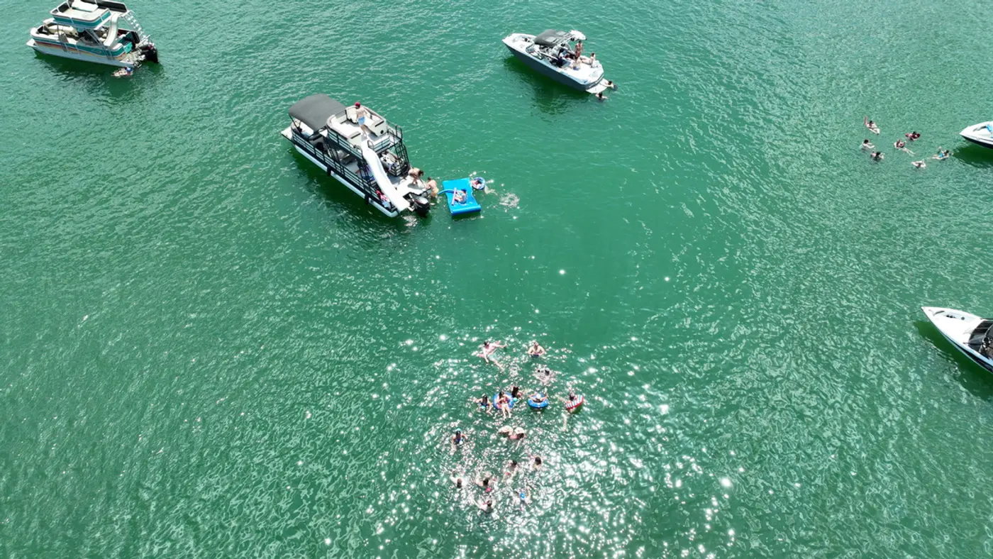 Aerial drone shot of an H2Overboard party anchored on Lake Norman